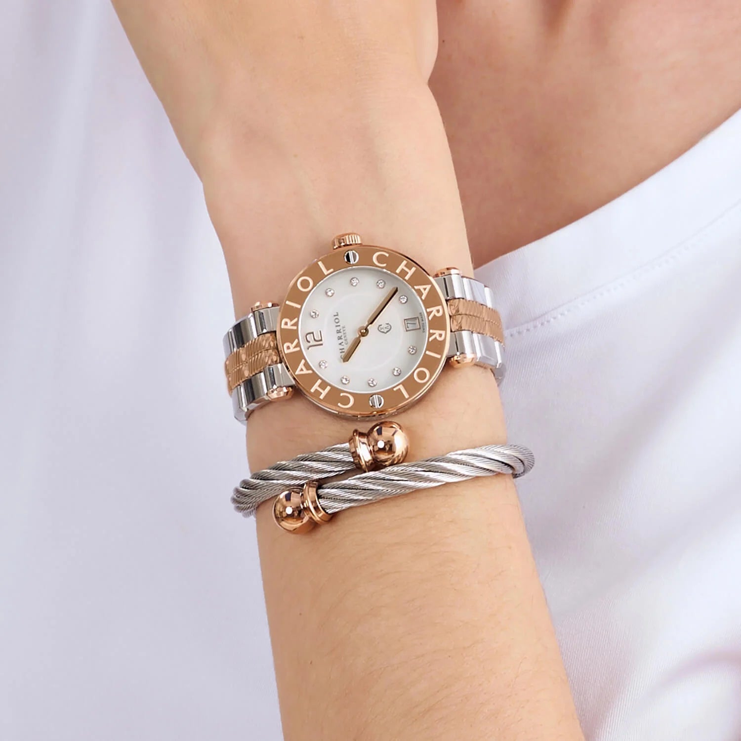 NAVIGATOR CRUISE, 36MM, QUARTZ CALIBRE, WHITE MOTHER-OF-PEARL WITH 10 DIAMONDS DIAL, STEEL ROSE GOLD PVD "CHARRIOL CHARRIOL" WITH 2 SCREWS BEZEL, METAL BICOLOR INTERCHANGEABLE BRACELET - © 2024 Charriol - Watch